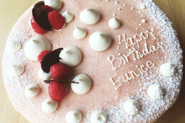 A rose macaron cake for Eunice birthday